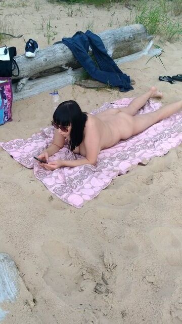 Hairy brunette Russian milf on the beach