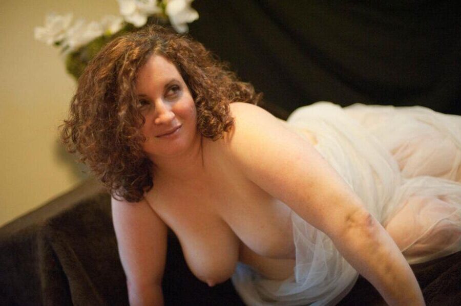 Chubby and pregnant milf with curly hair