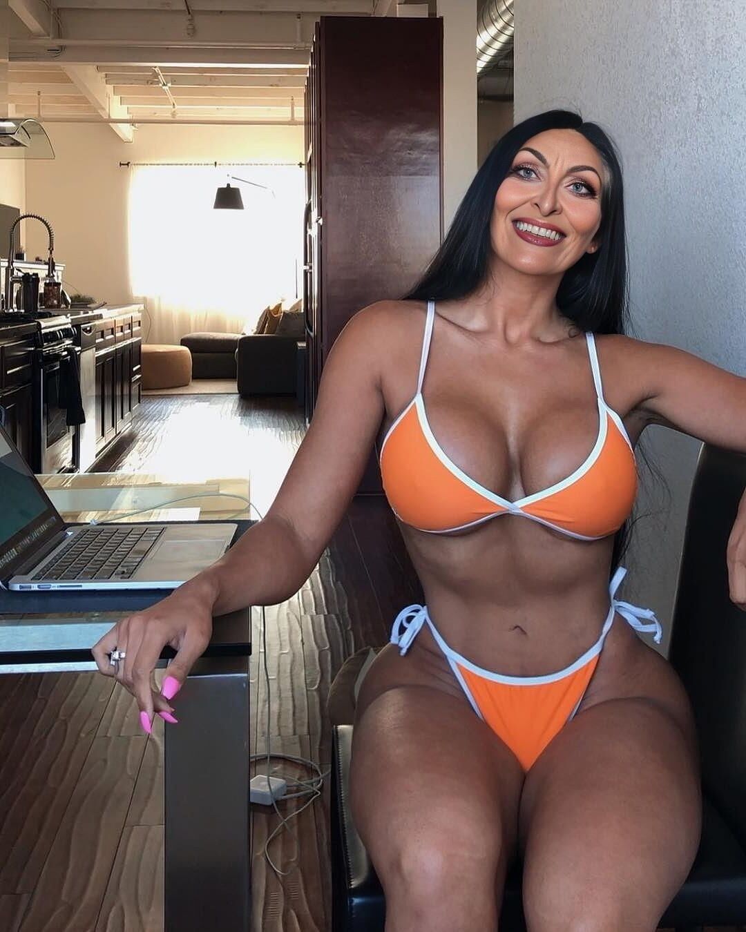 Big tit orange bikini