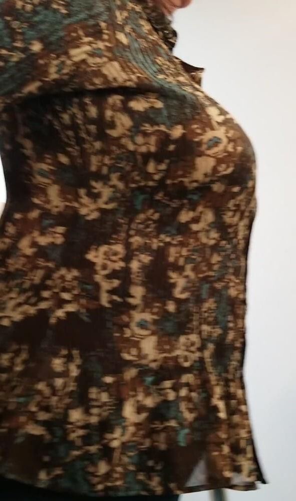 Candid Cougar in camouflage blouse big tits