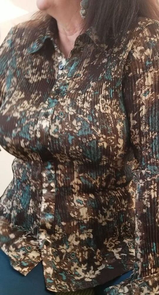 Candid Cougar in camouflage blouse big tits