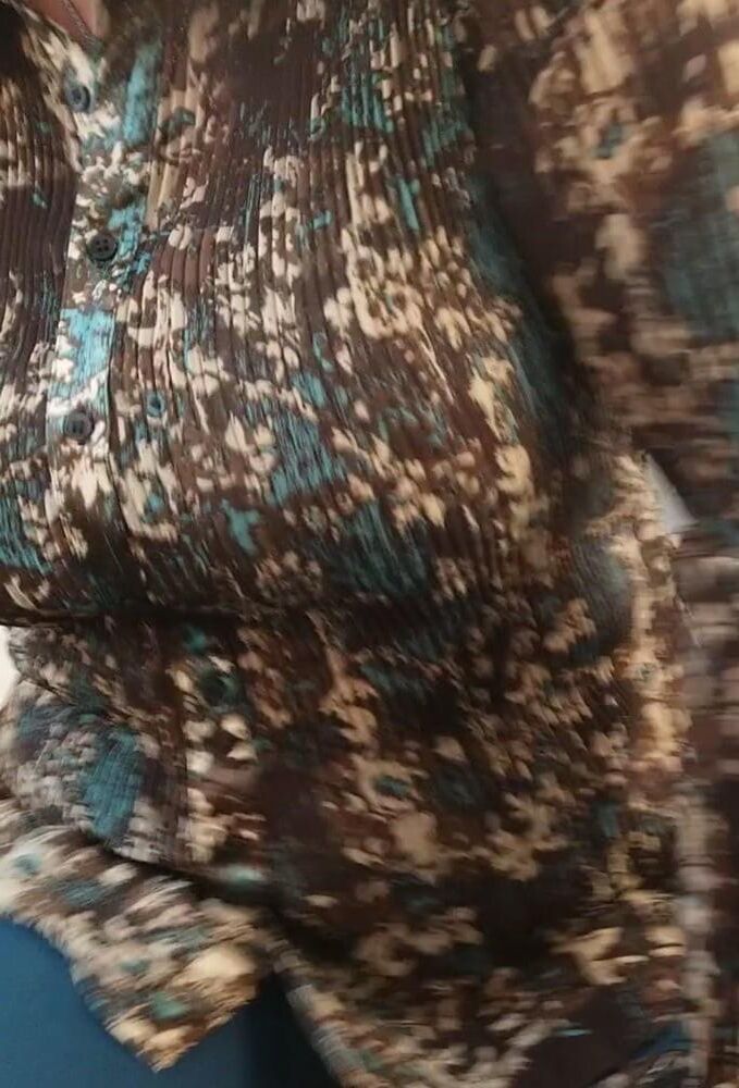 Candid Cougar in camouflage blouse big tits