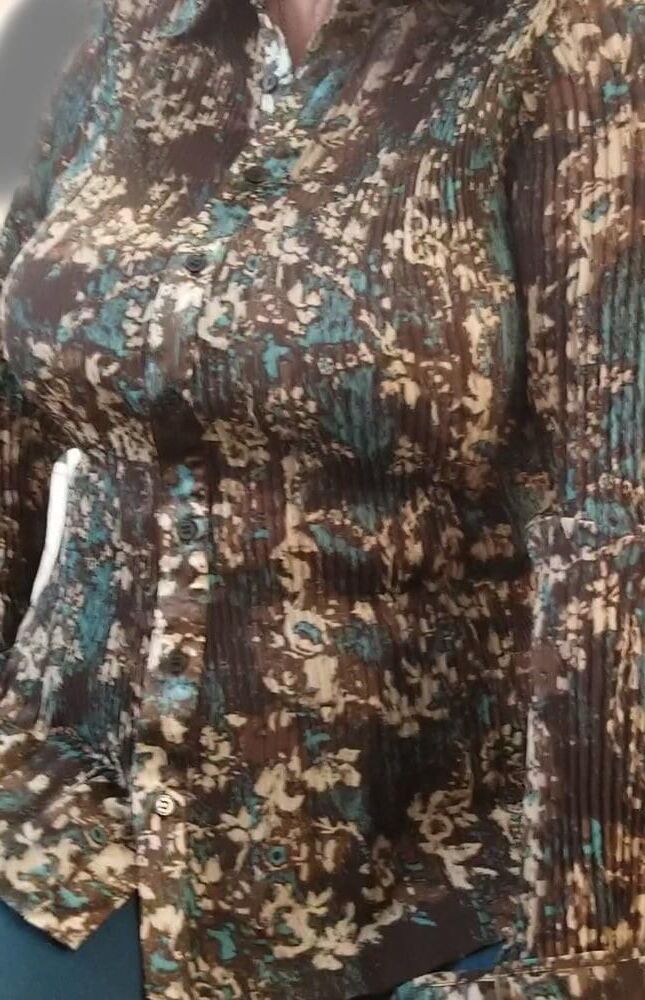 Candid Cougar in camouflage blouse big tits