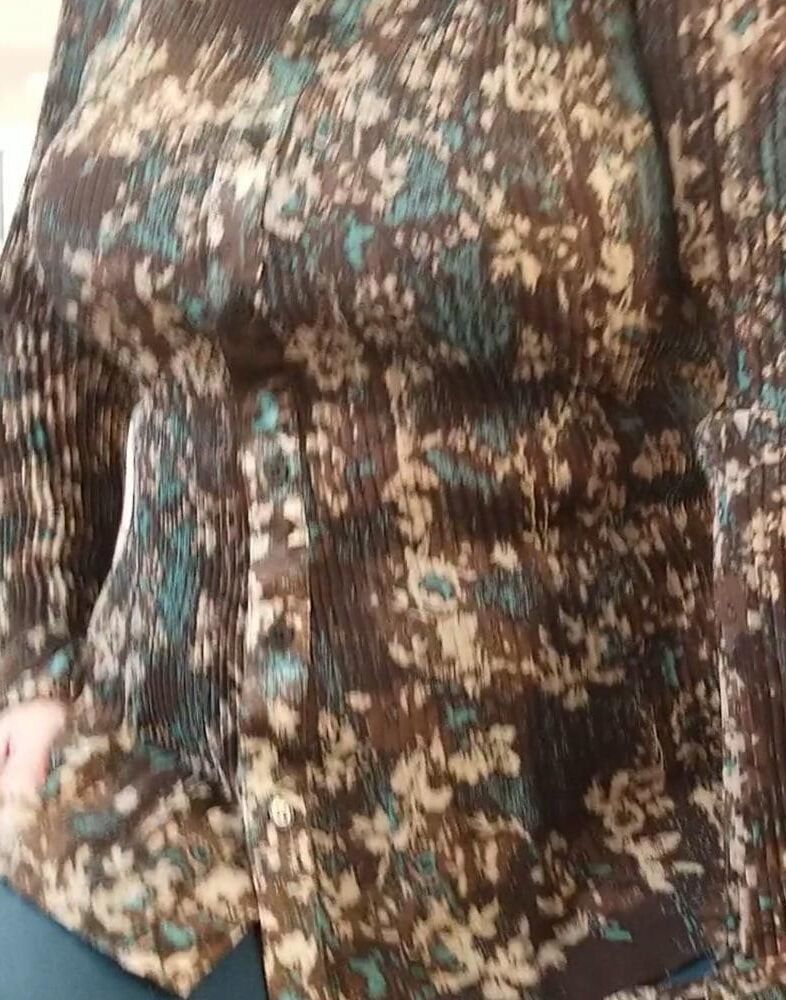 Candid Cougar in camouflage blouse big tits