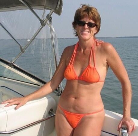 Mature beach bikini and outdoors