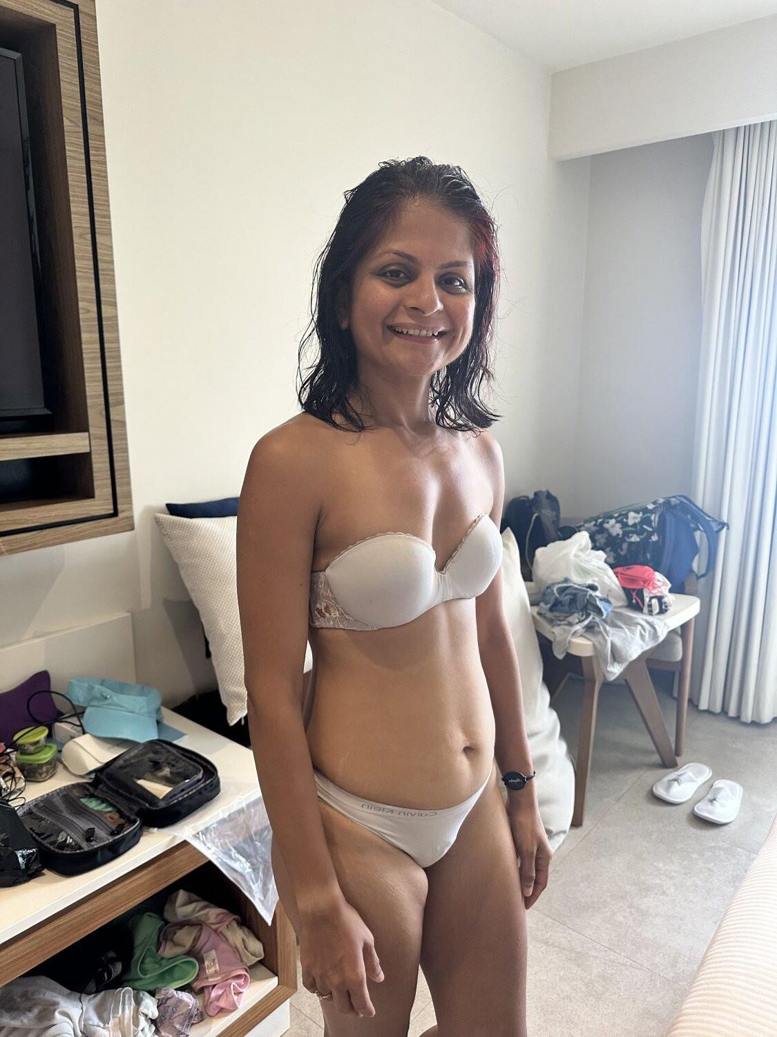 Saggy small tit bikini milf 