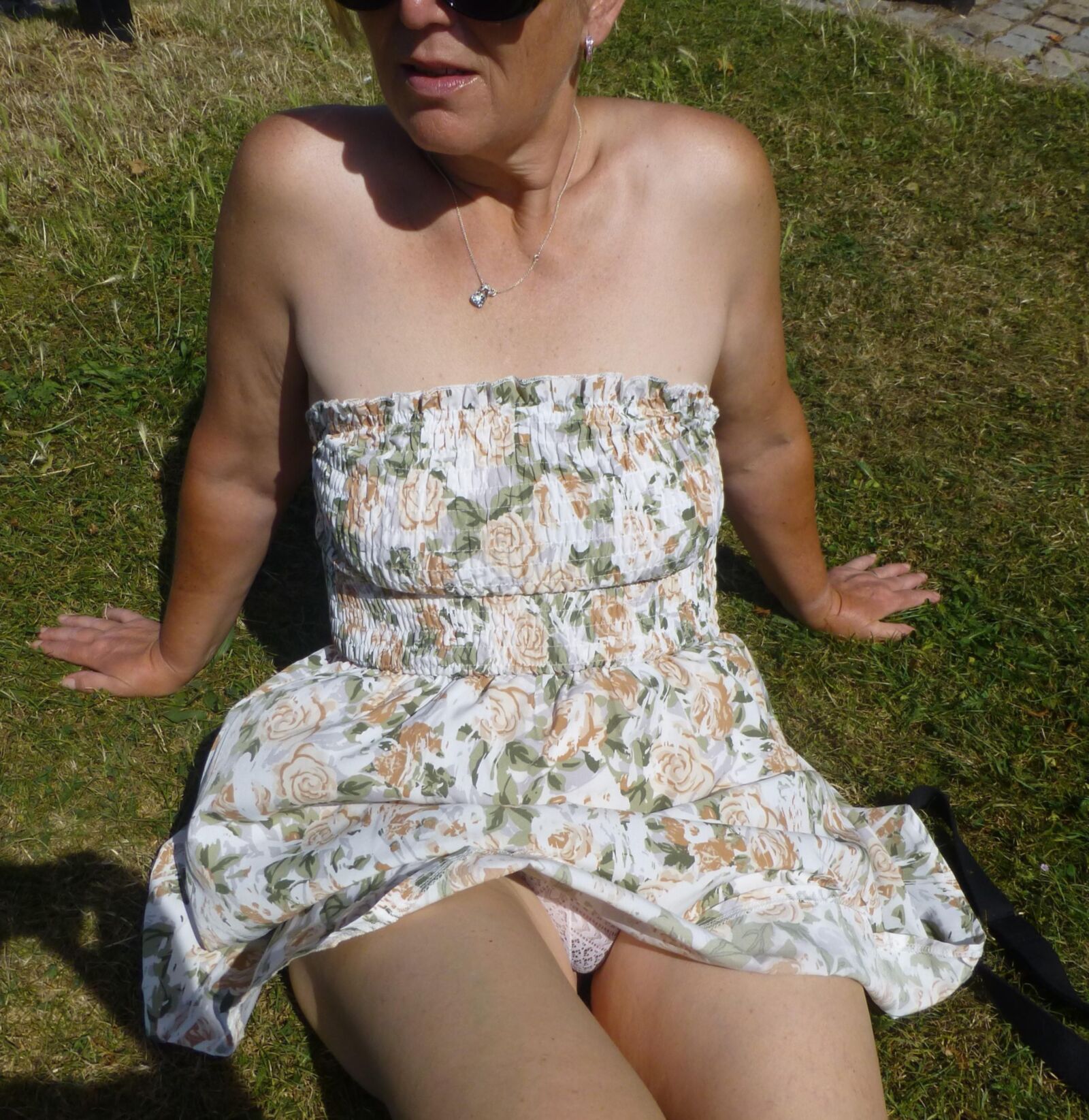 Voyeur mature upskirt showing her white lace knickers 