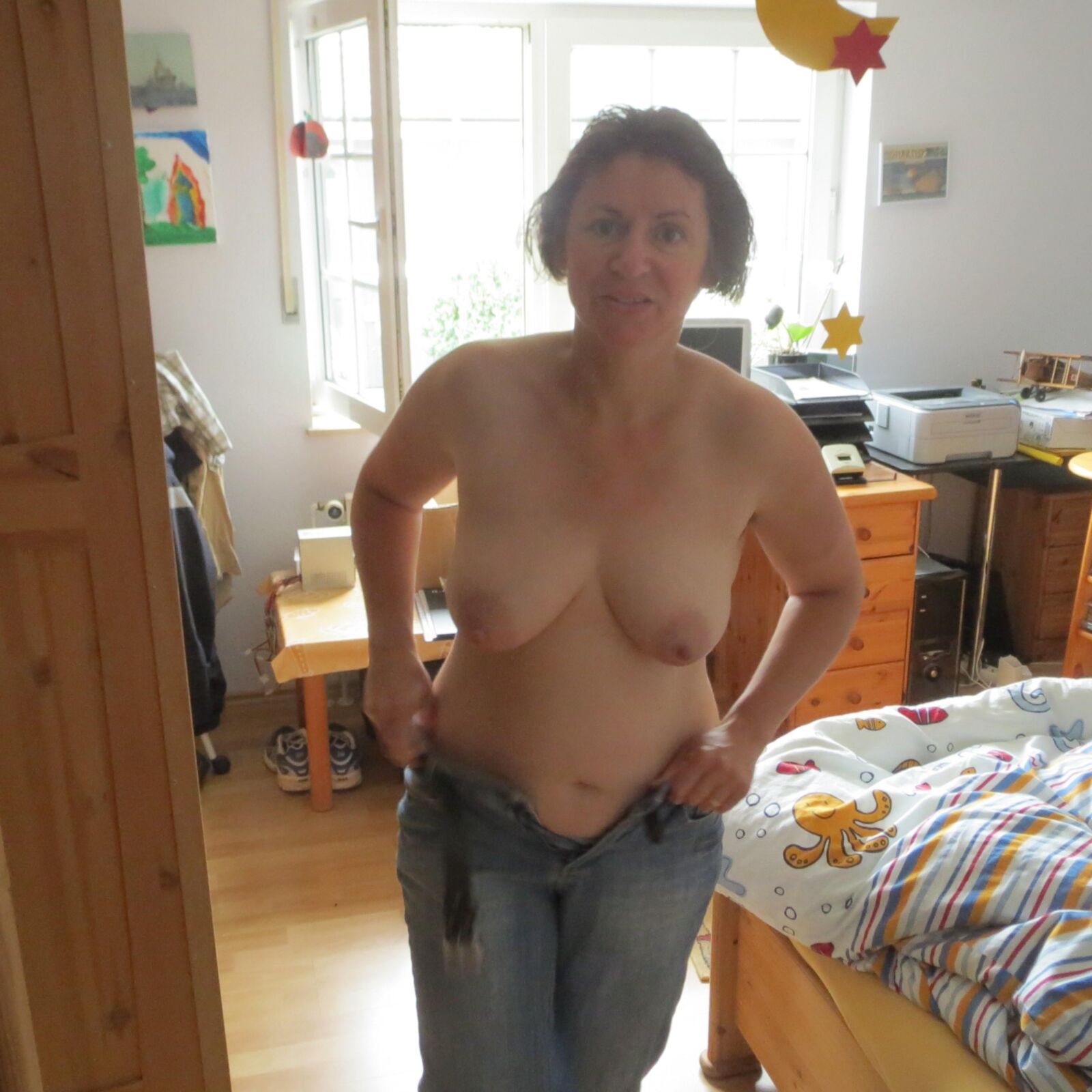 Birgit a german MILF shows her huge tits