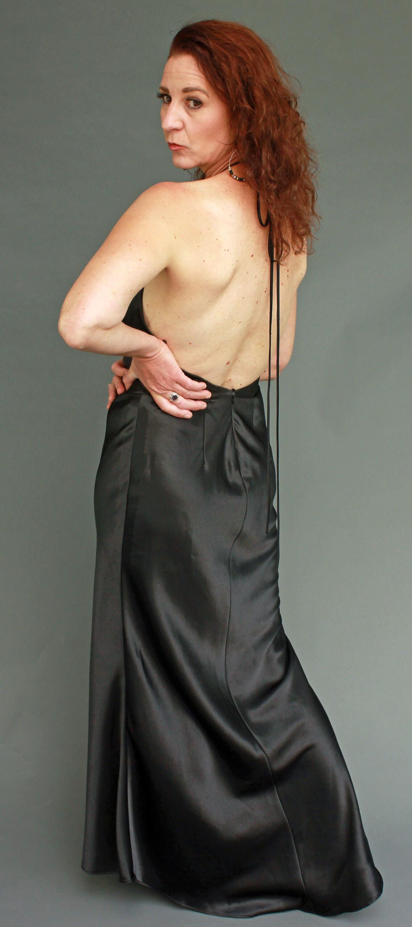 Mature fuckpig in black satin (NN)