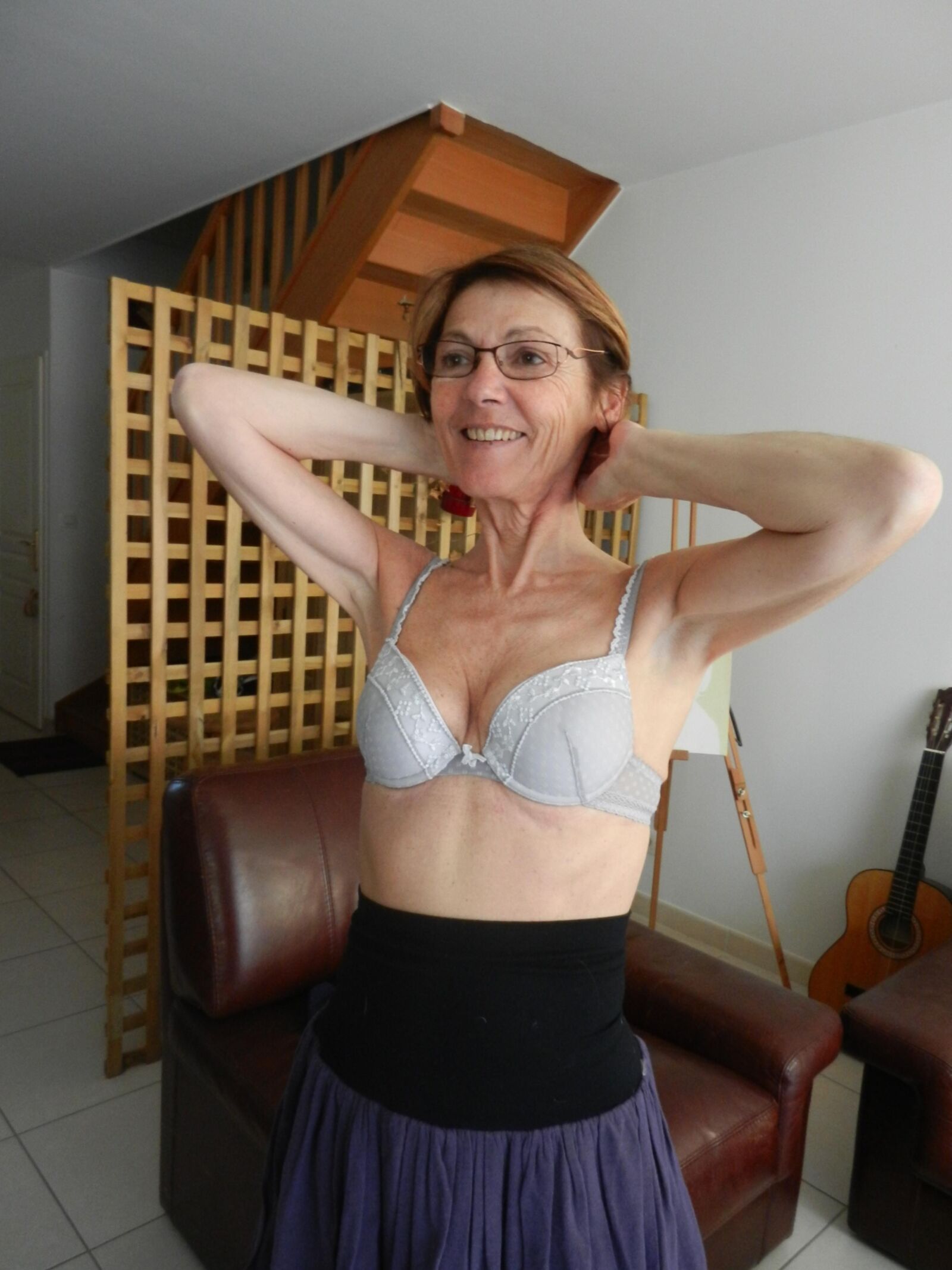 Smiling skinny granny Annie in living room HD