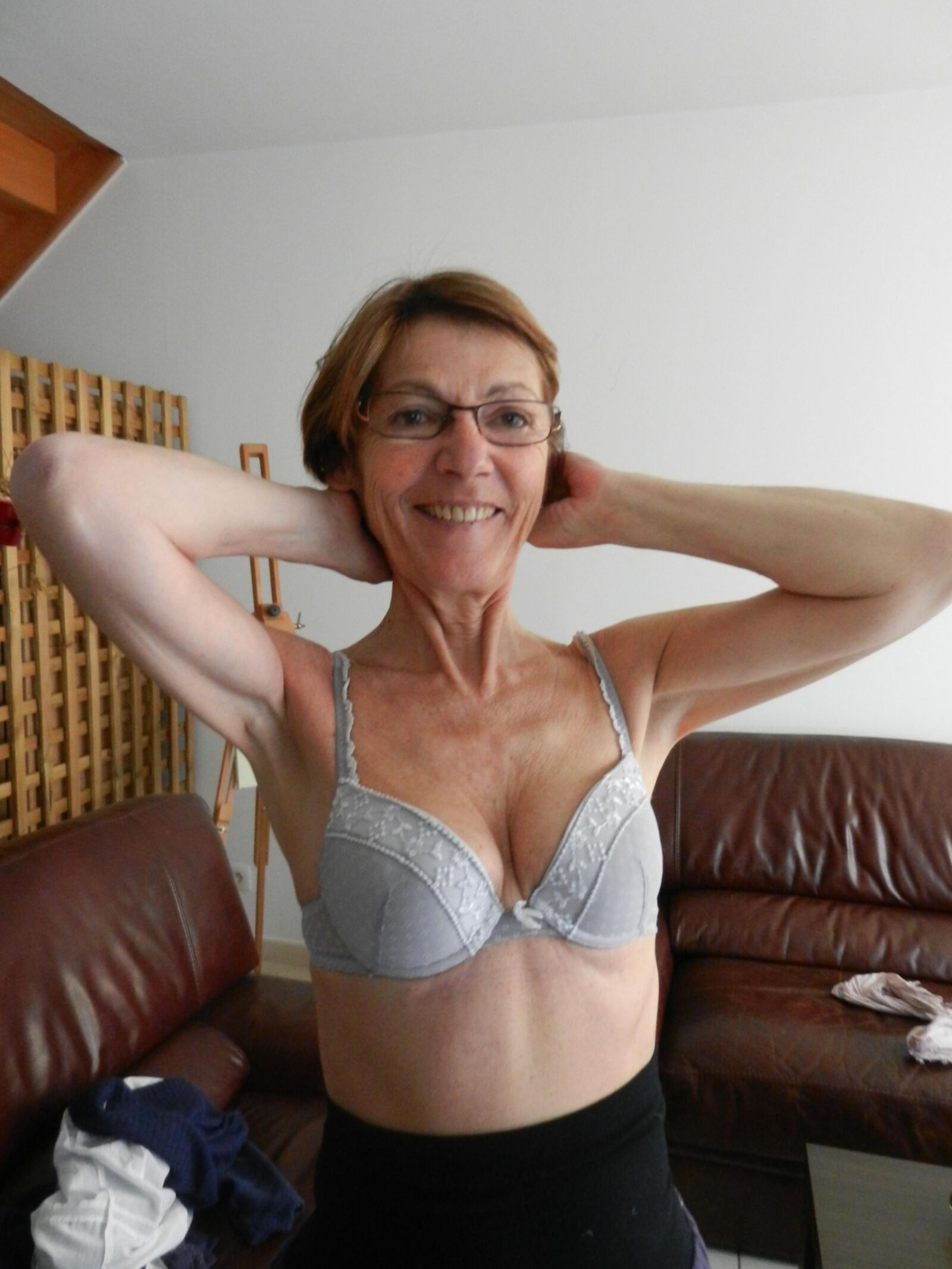 Smiling skinny granny Annie in living room HD