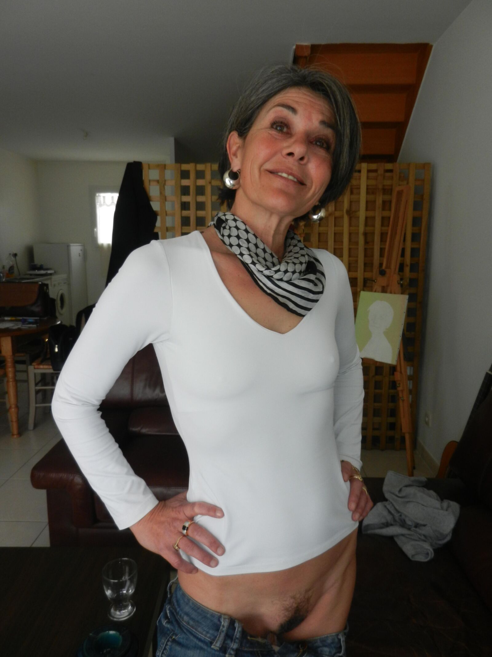 Shy skinny mature Beatrice undressing on sofa in living room HD