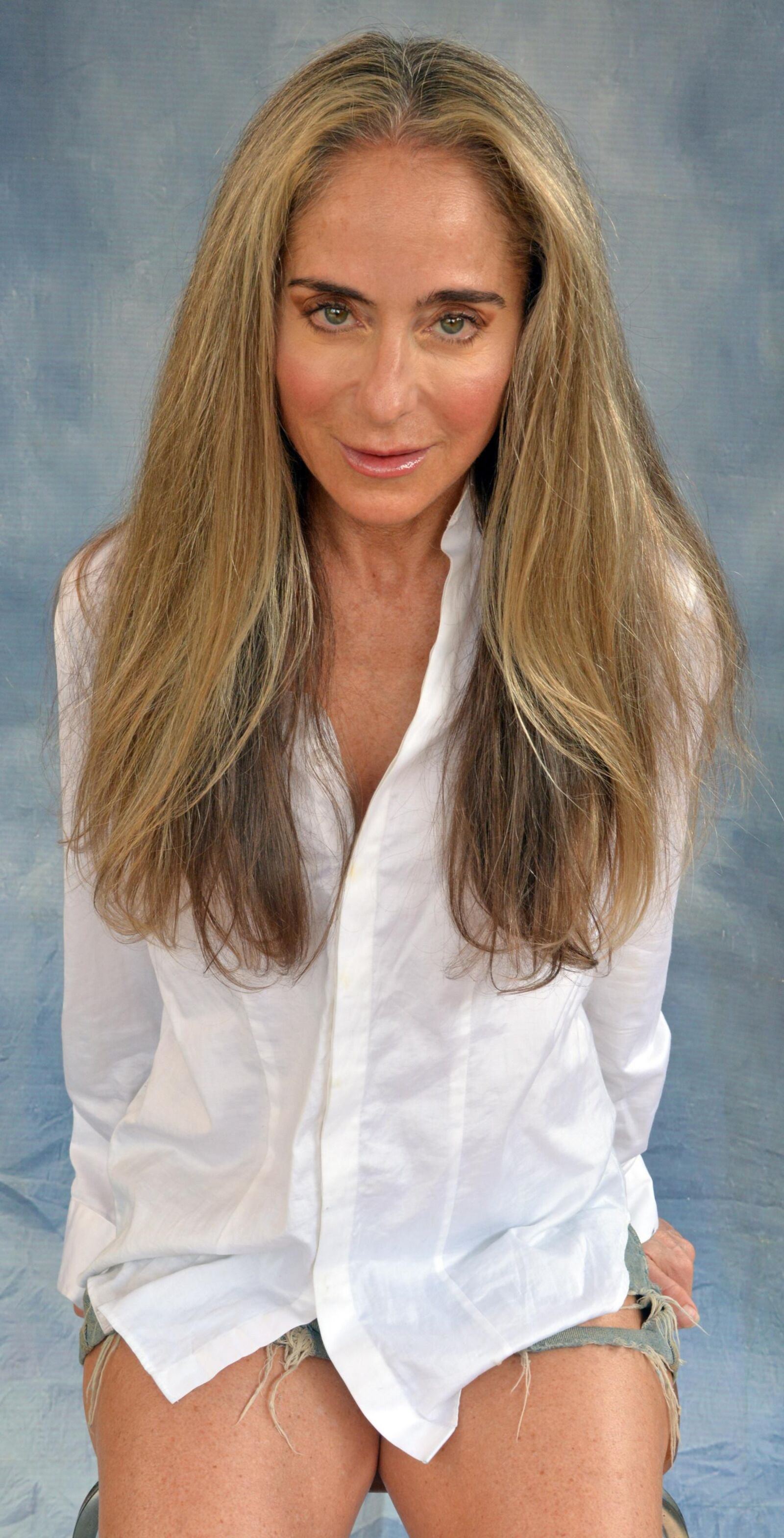 Skanky mature slut in white shirt