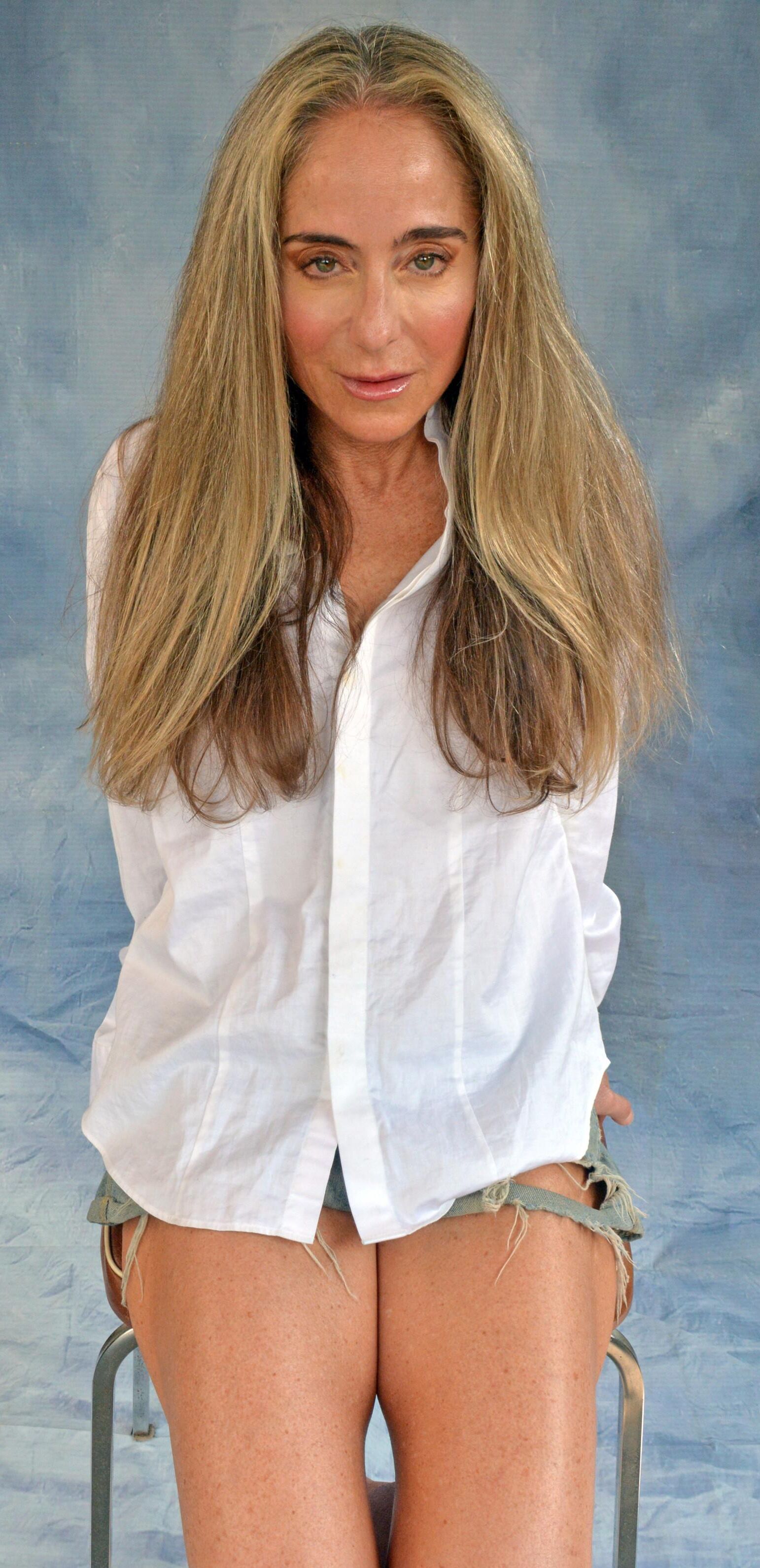 Skanky mature slut in white shirt