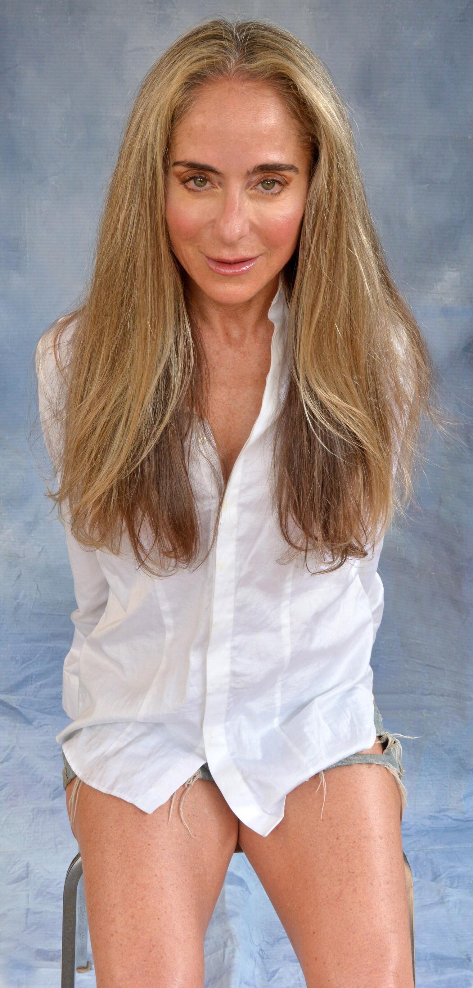 Skanky mature slut in white shirt