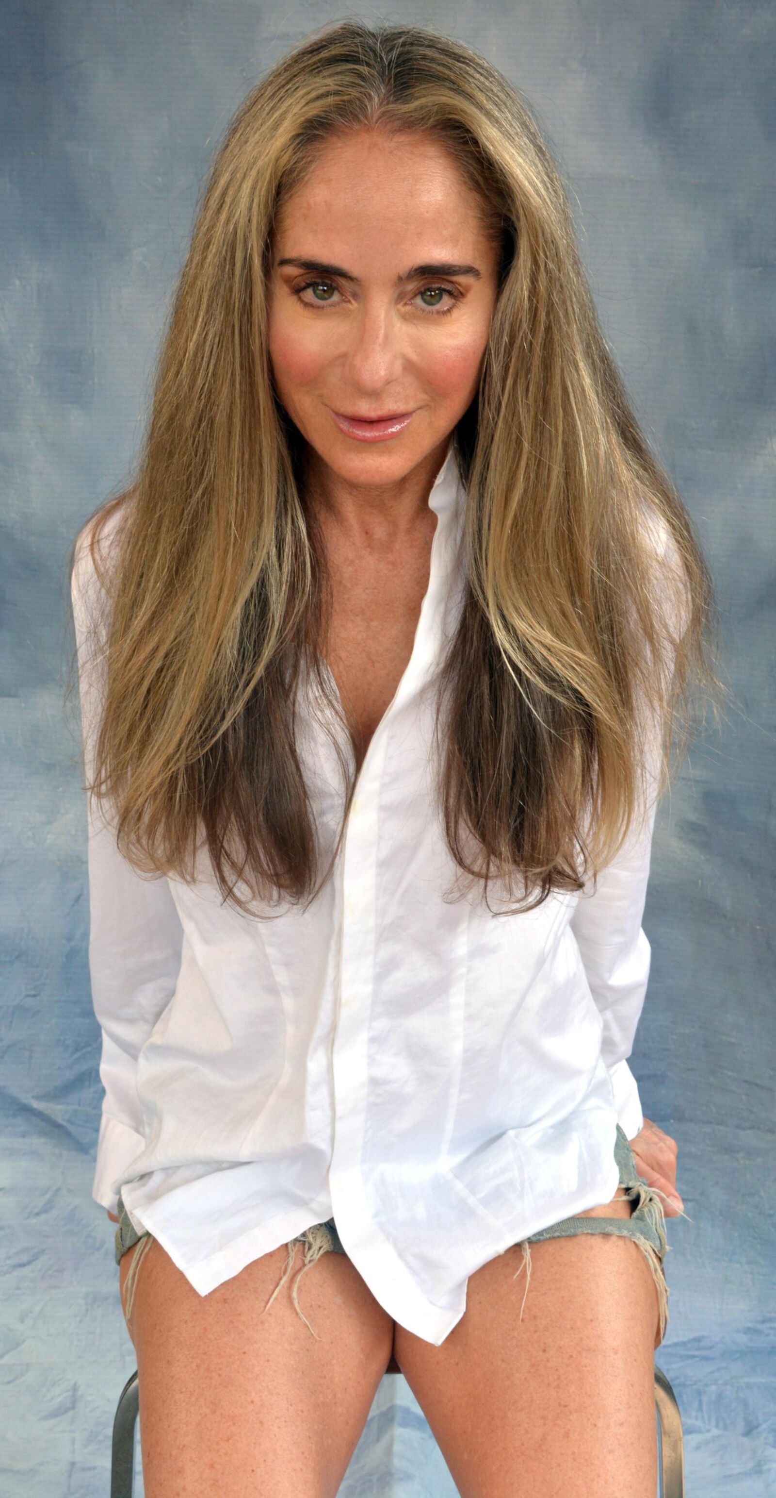 Skanky mature slut in white shirt