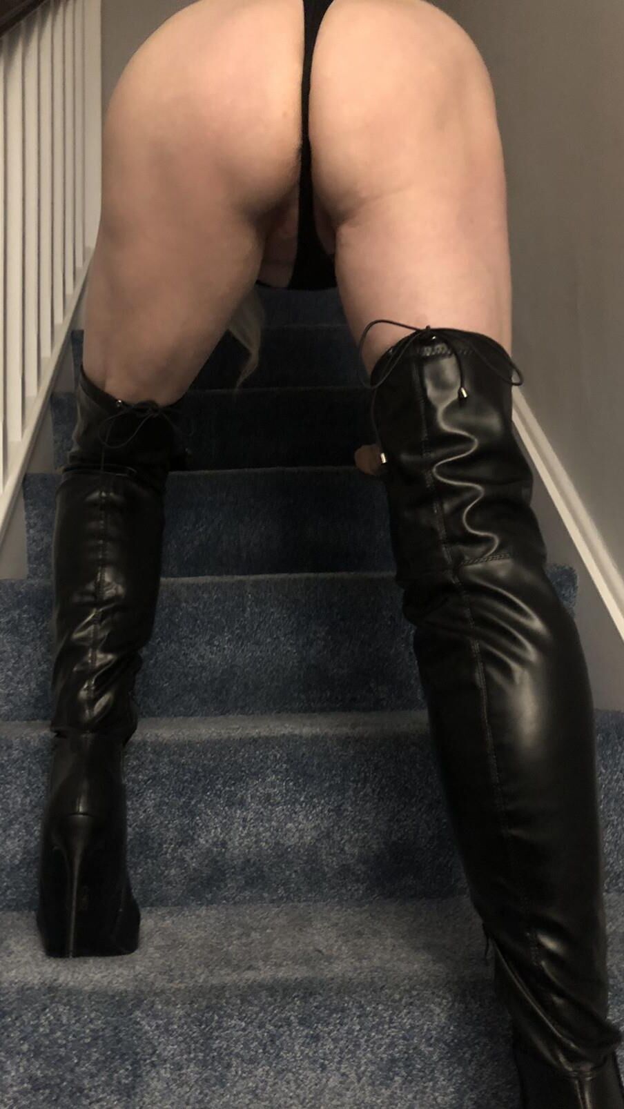 Mature in thigh length boots 