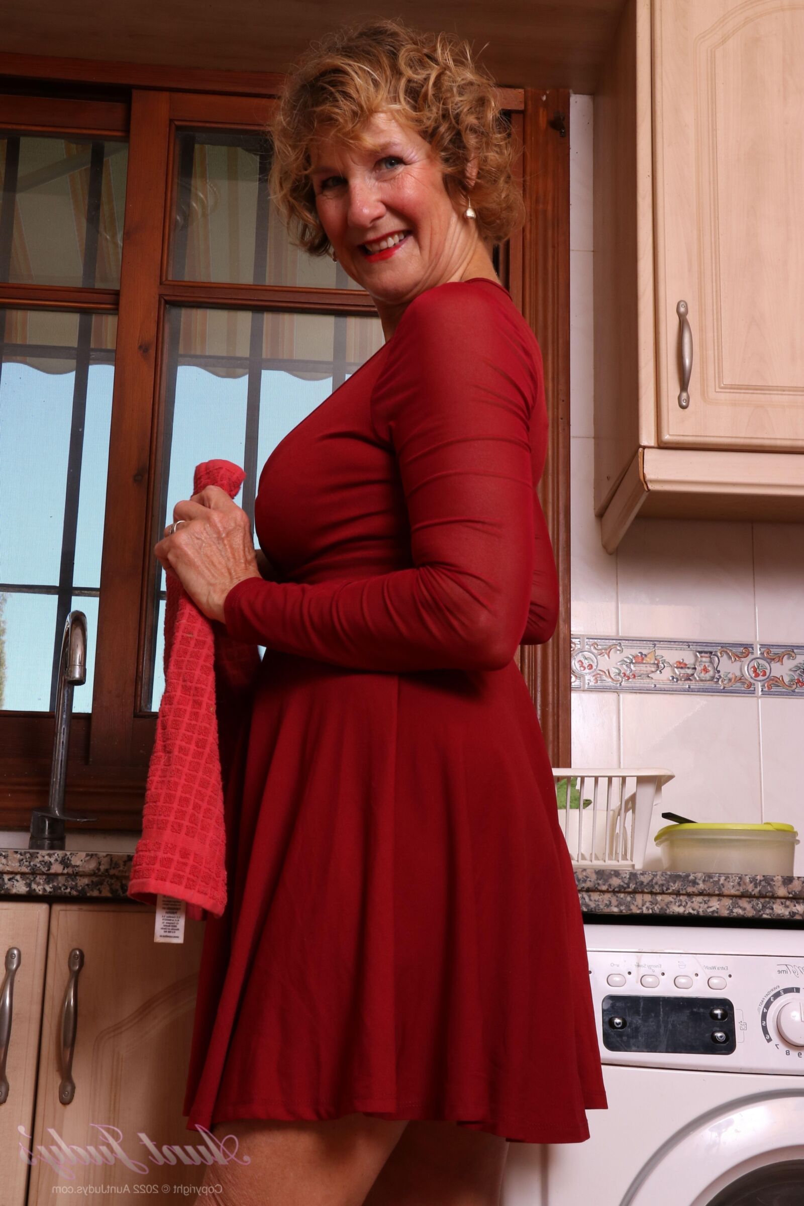 AuntJudys Molly Strips and Masturbates for You in the Kitchen
