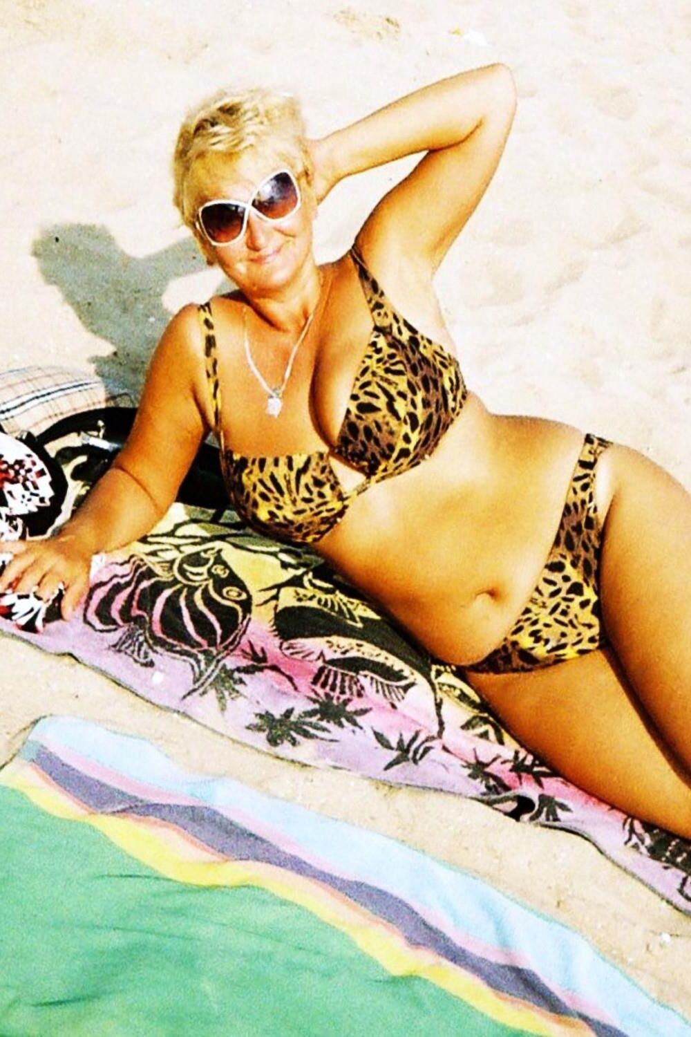 Posing in tiger bikini