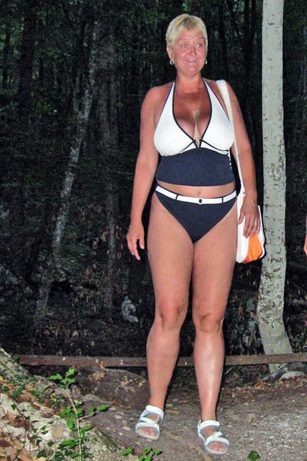 Posing in black and white bikini/swimsuit