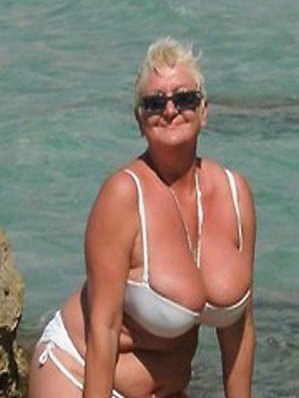 Posing in white bikini