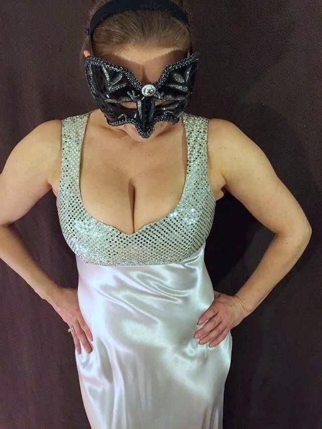 My wife Irene exposing her hanging breasts