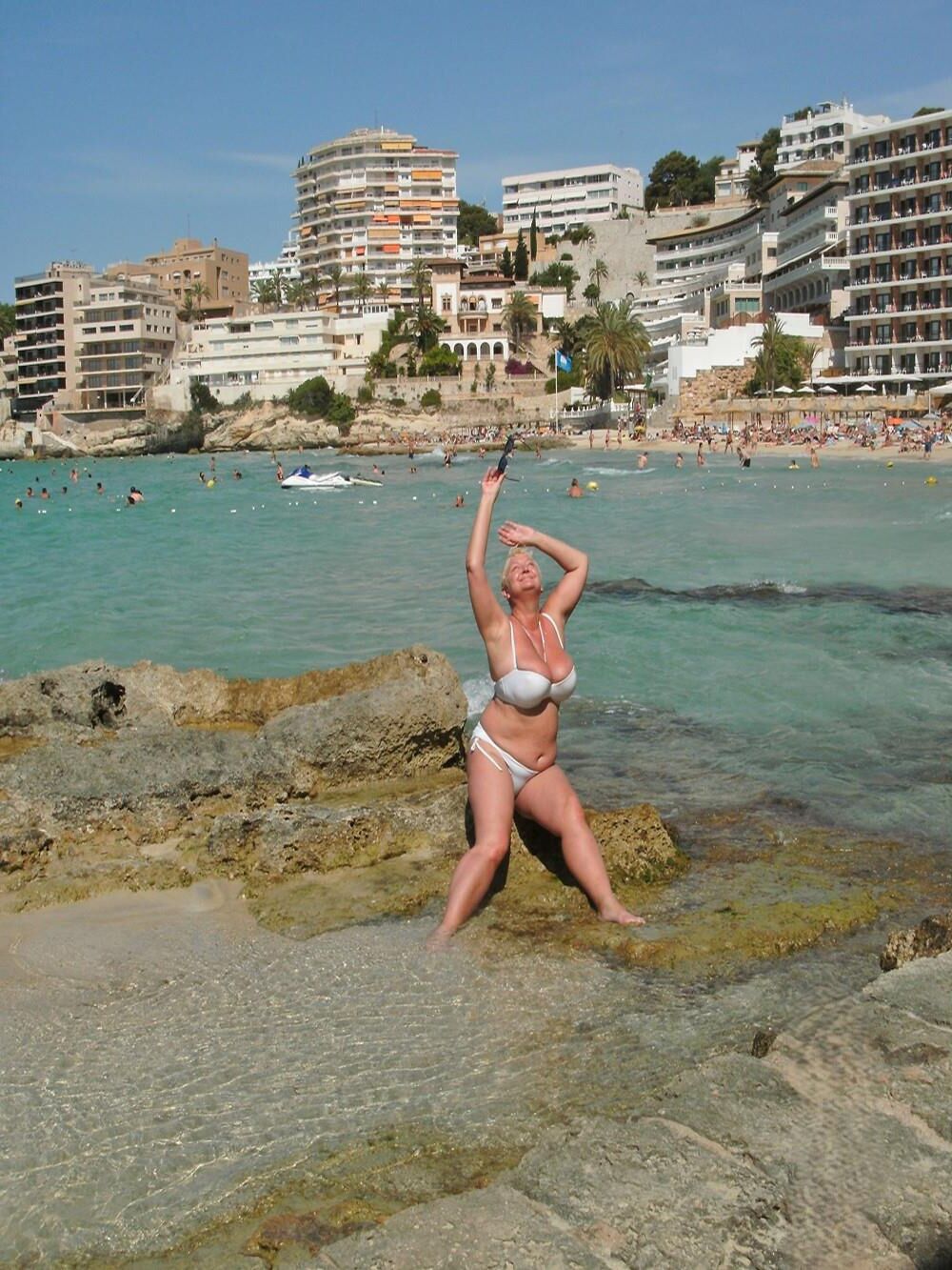 Posing in white bikini