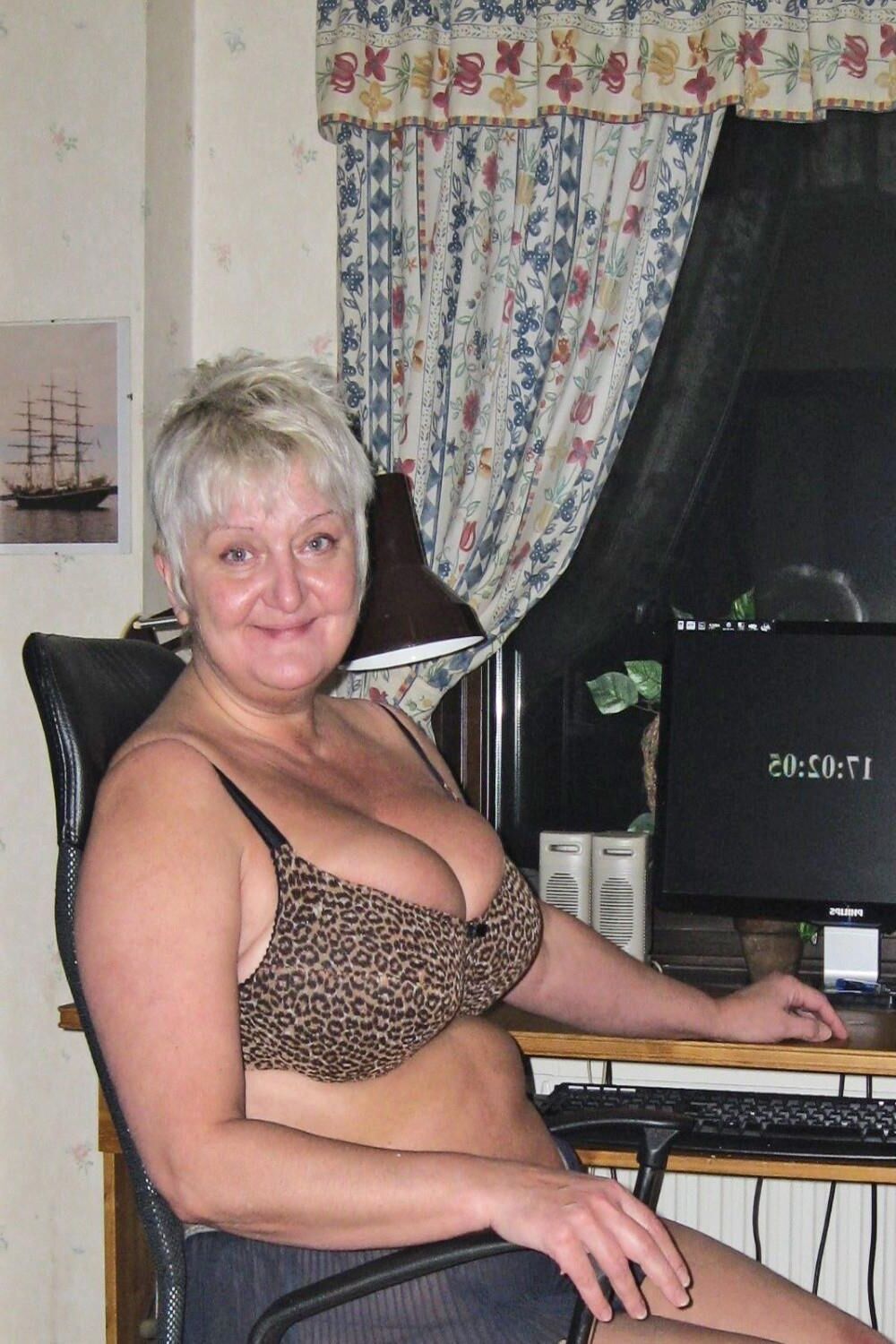 Posing in leopard bra