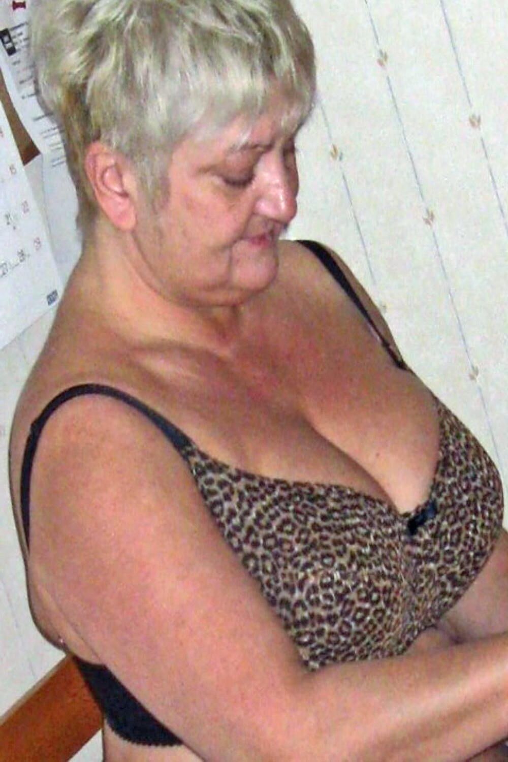 Posing in leopard bra