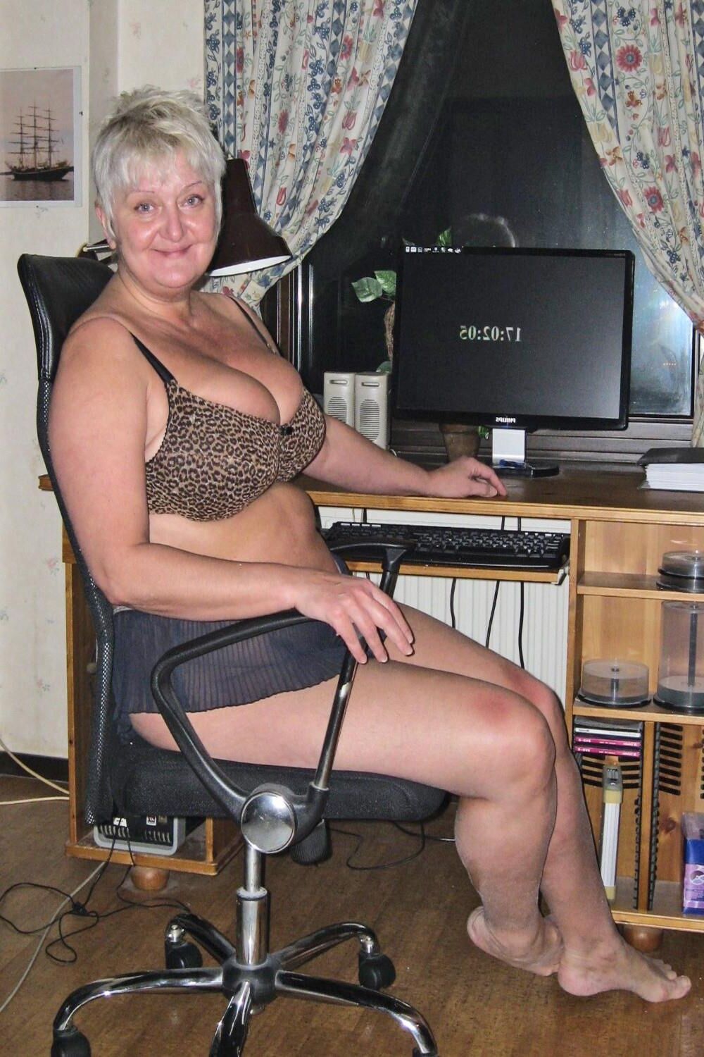 Posing in leopard bra