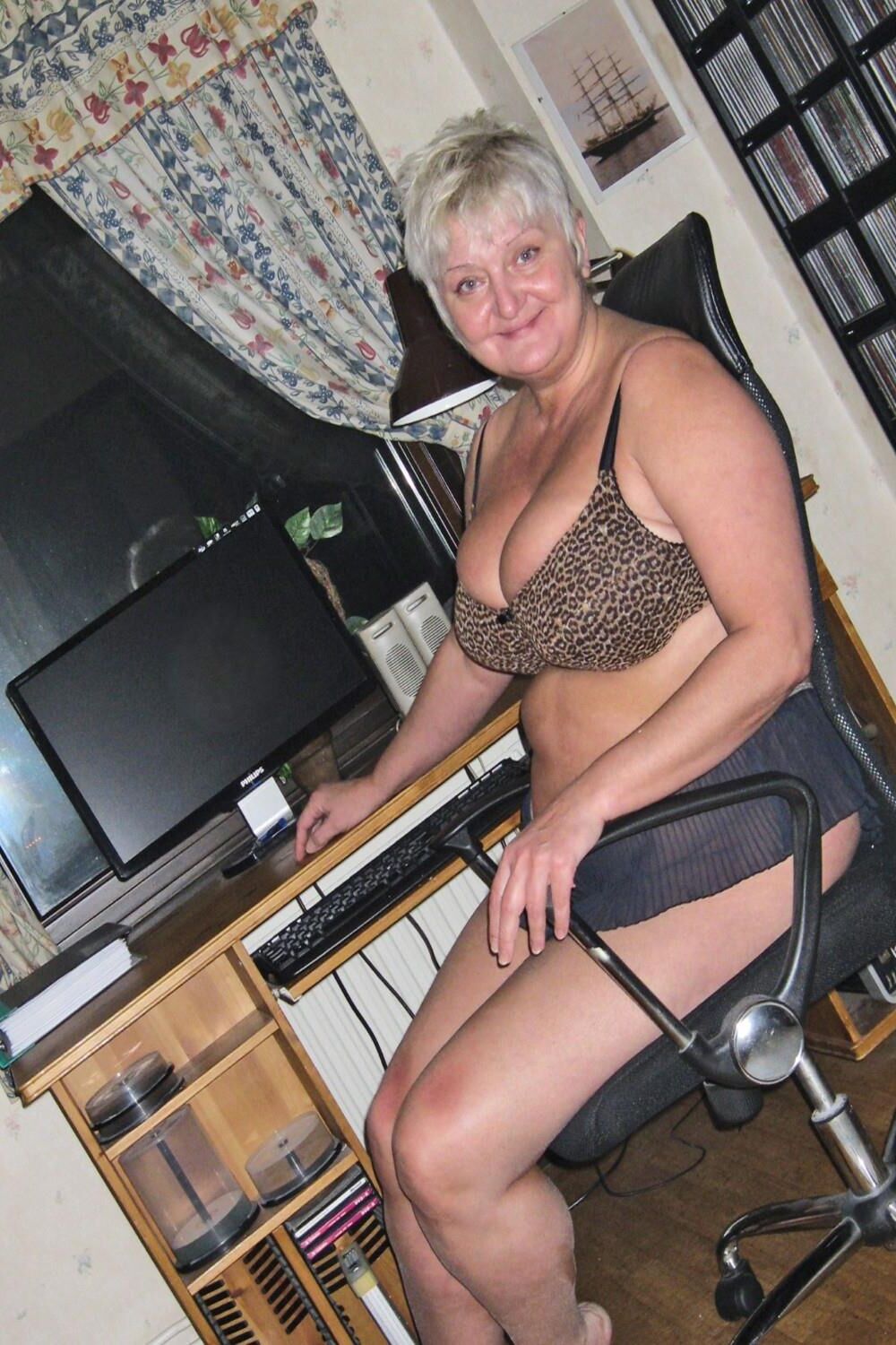 Posing in leopard bra