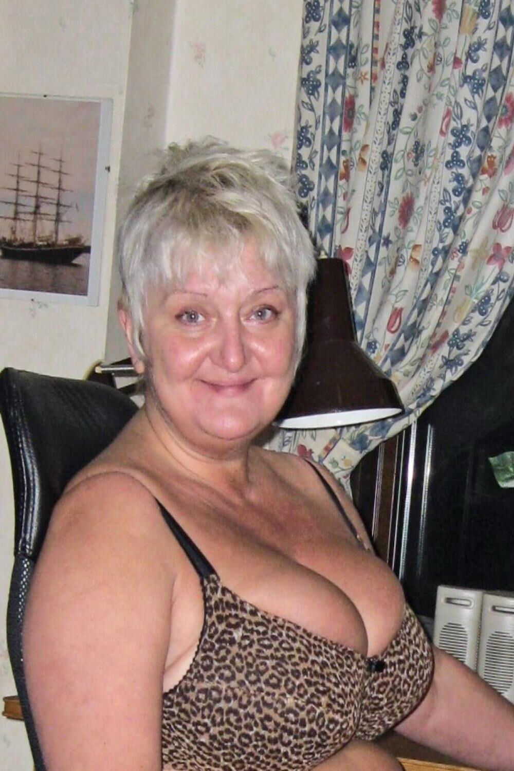 Posing in leopard bra