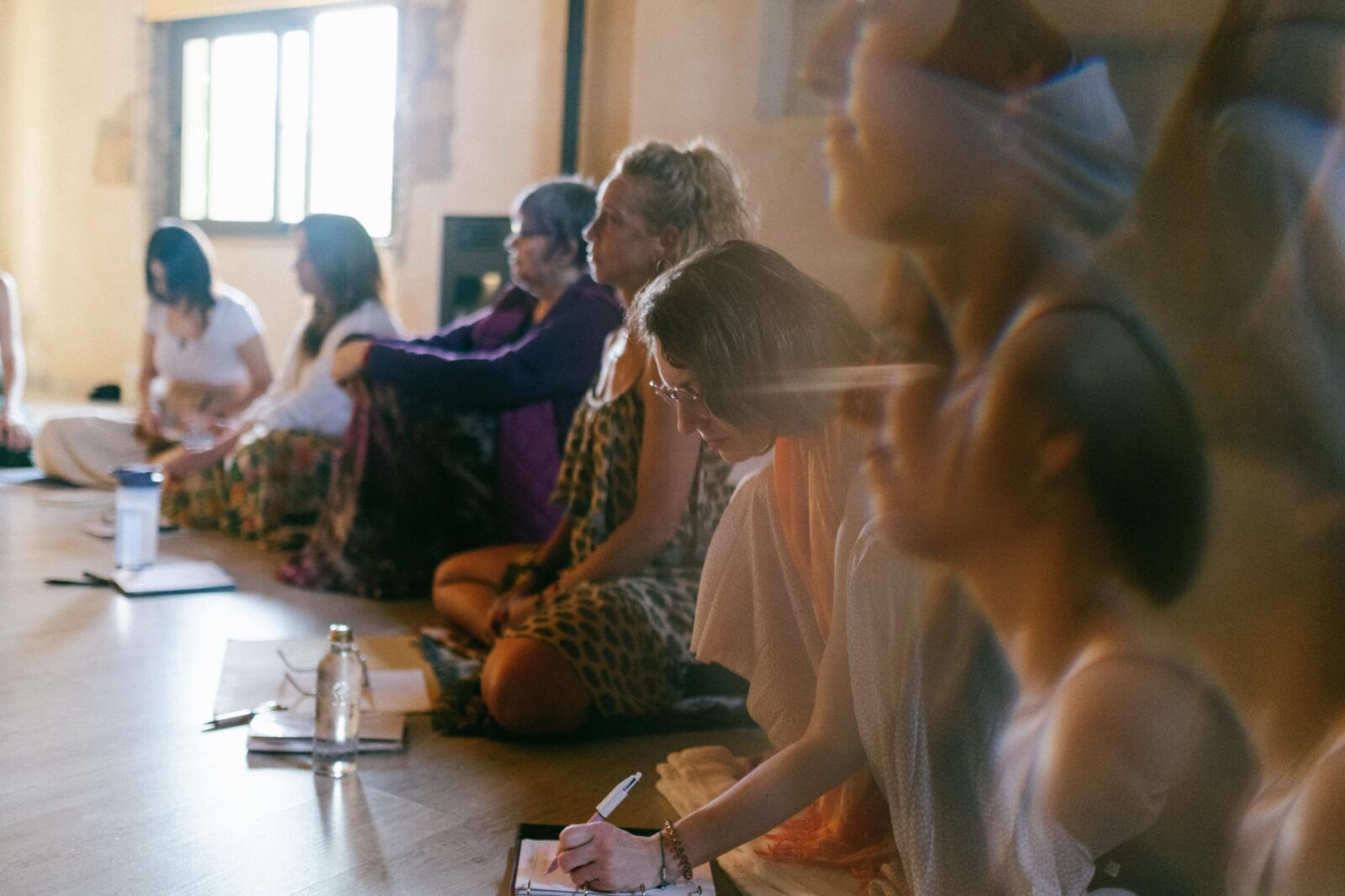 Mature spiritual girls on yoga retreat