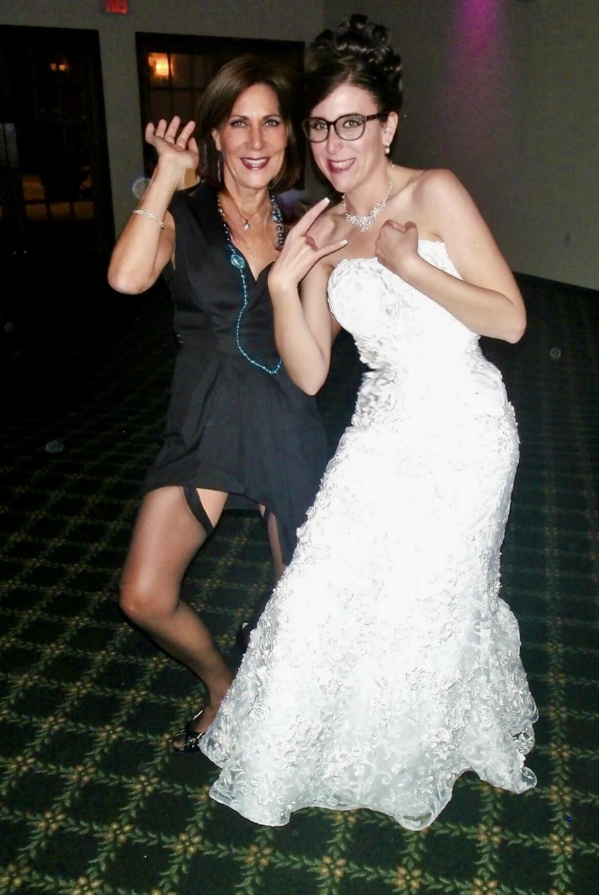 Showing off her stocking tops at family wedding 