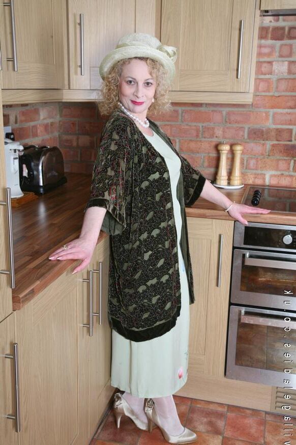 Busty Mrs C in the kitchen