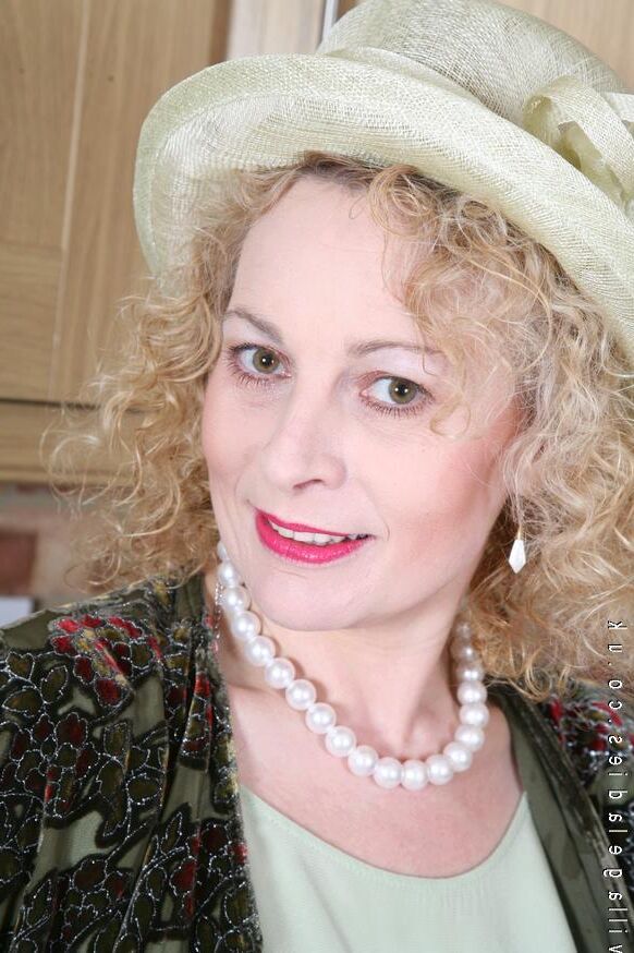 Busty Mrs C in the kitchen