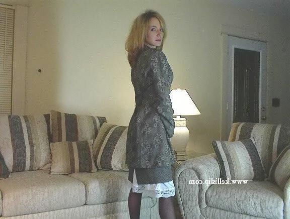 Kelli SG Grey suit, white full slip in the living room