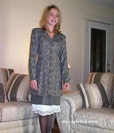 Kelli SG Grey suit, white full slip in the living room