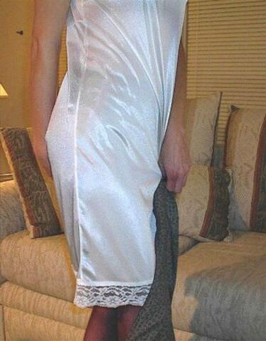 Kelli SG Grey suit, white full slip in the living room