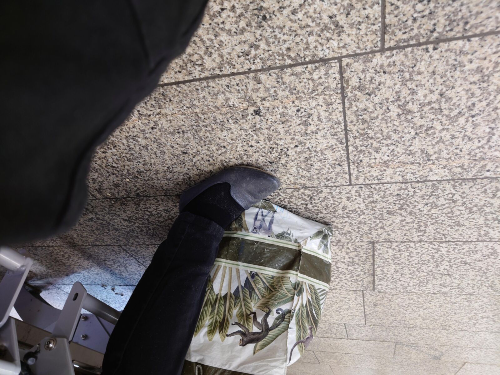 She feeds the pigeons in Worn Shoes & Socks