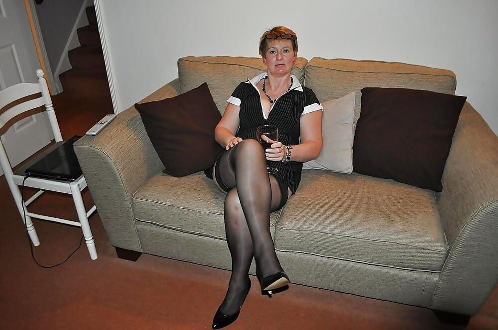 Mom, everybody can see your stockings tops.