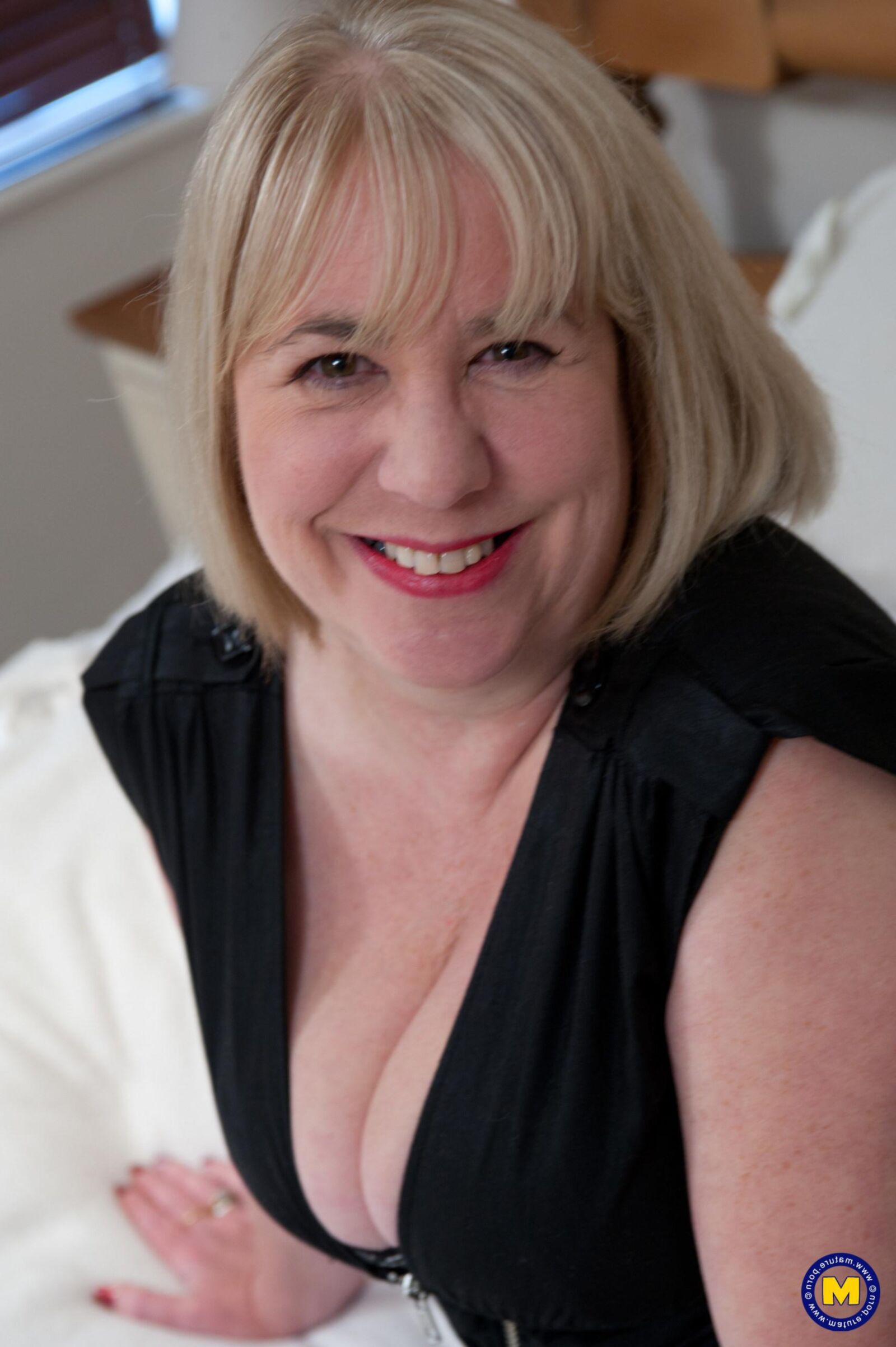 Beautiful mature blonde big tits