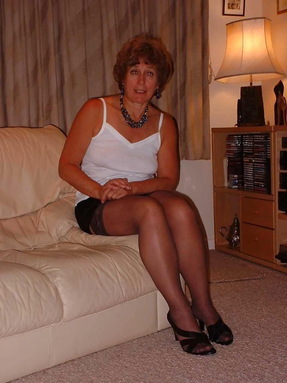 Mom, everybody can see your stockings tops 