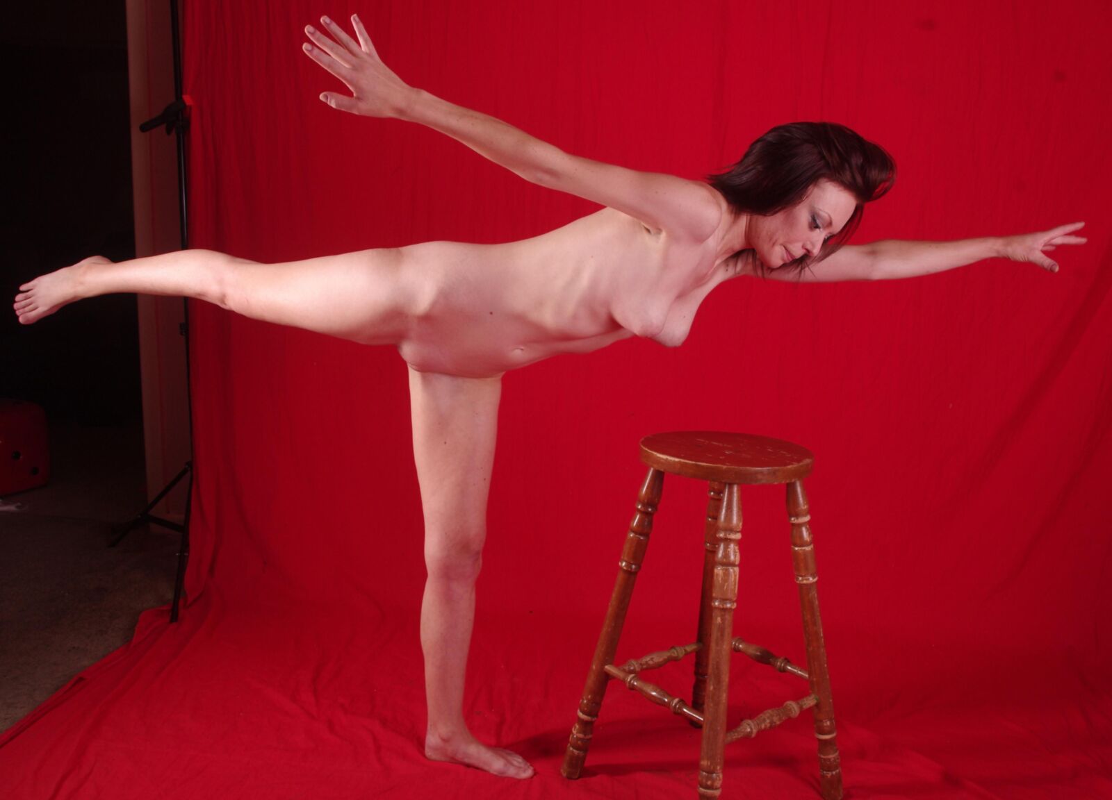 Naked slut forced into uncomfortable poses