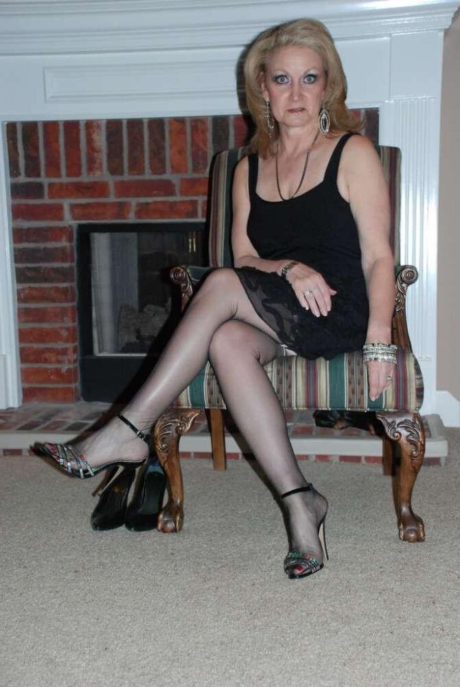 Mom, everybody can see your stockings tops 