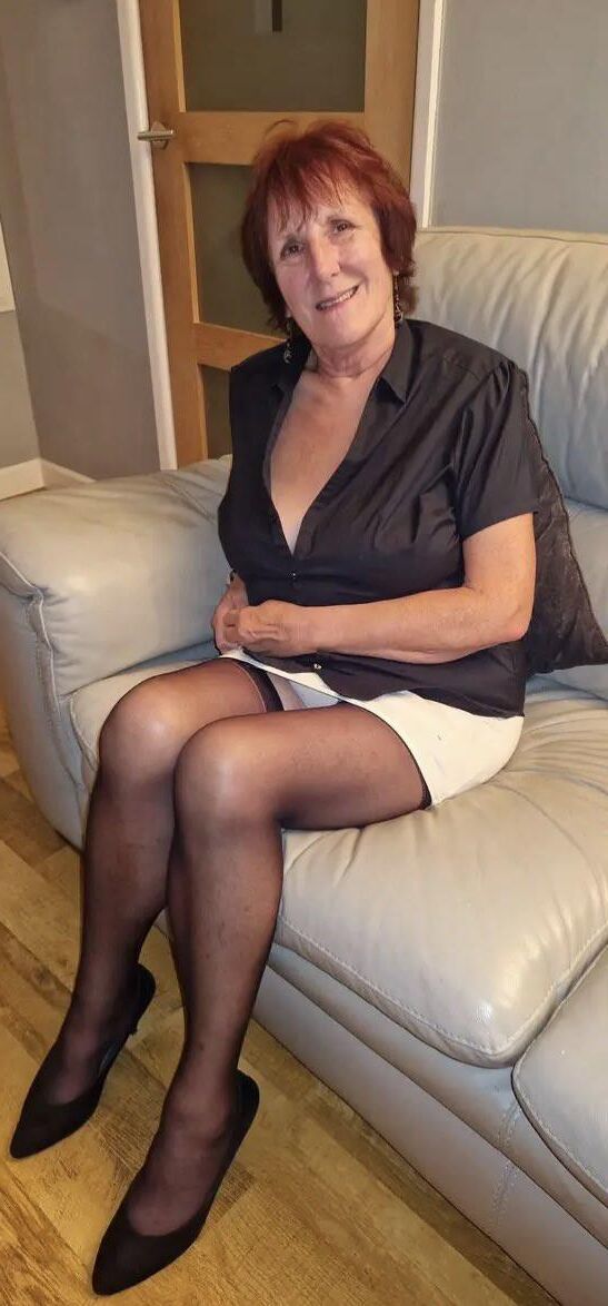 Mom, everybody can see your stockings tops 