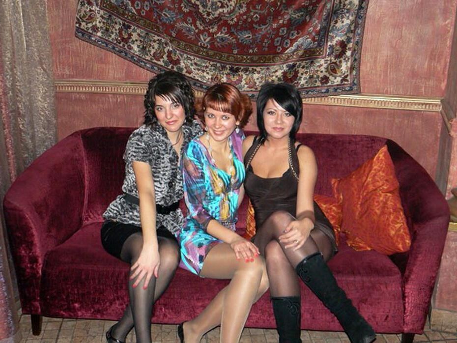 . Women fully dressed, no nudes