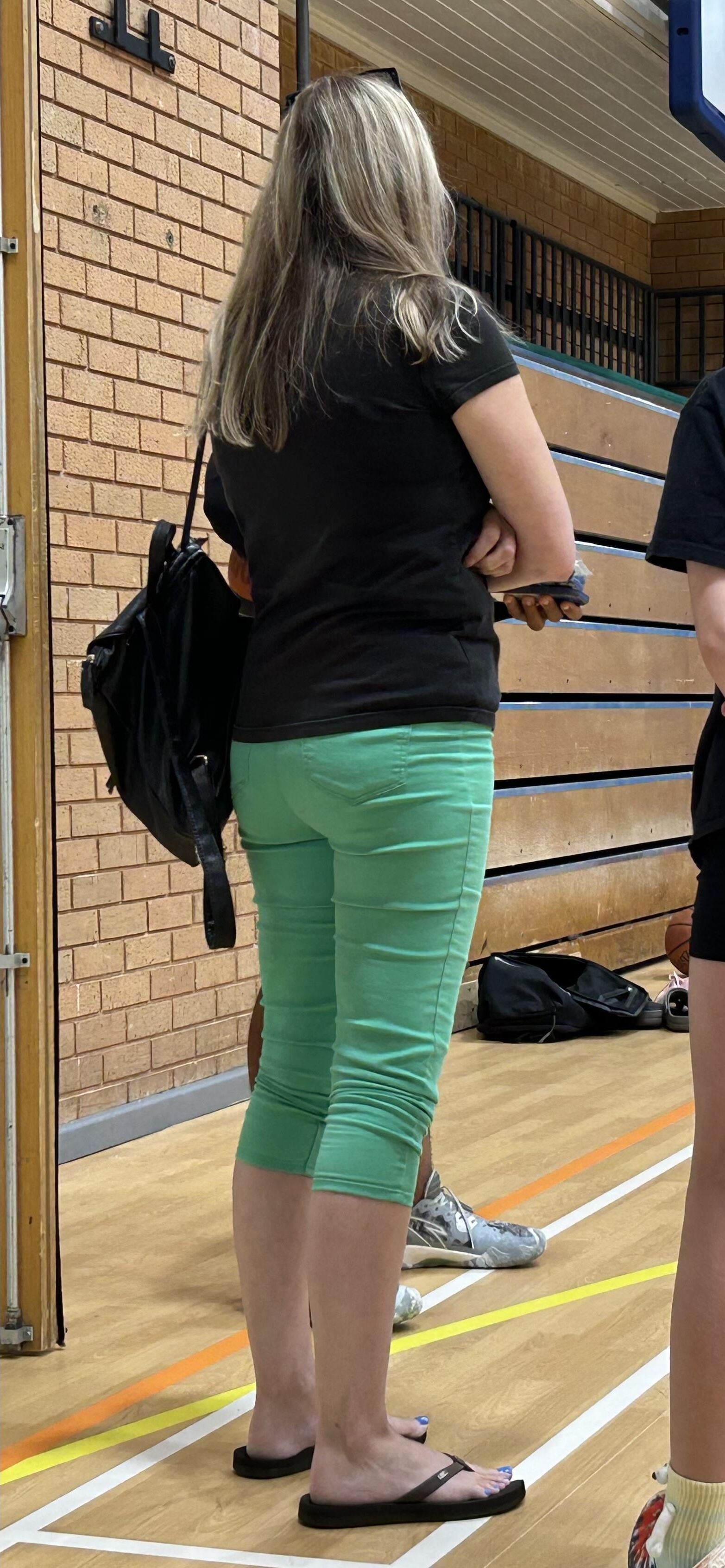 Sexy MILF bum in tight trousers