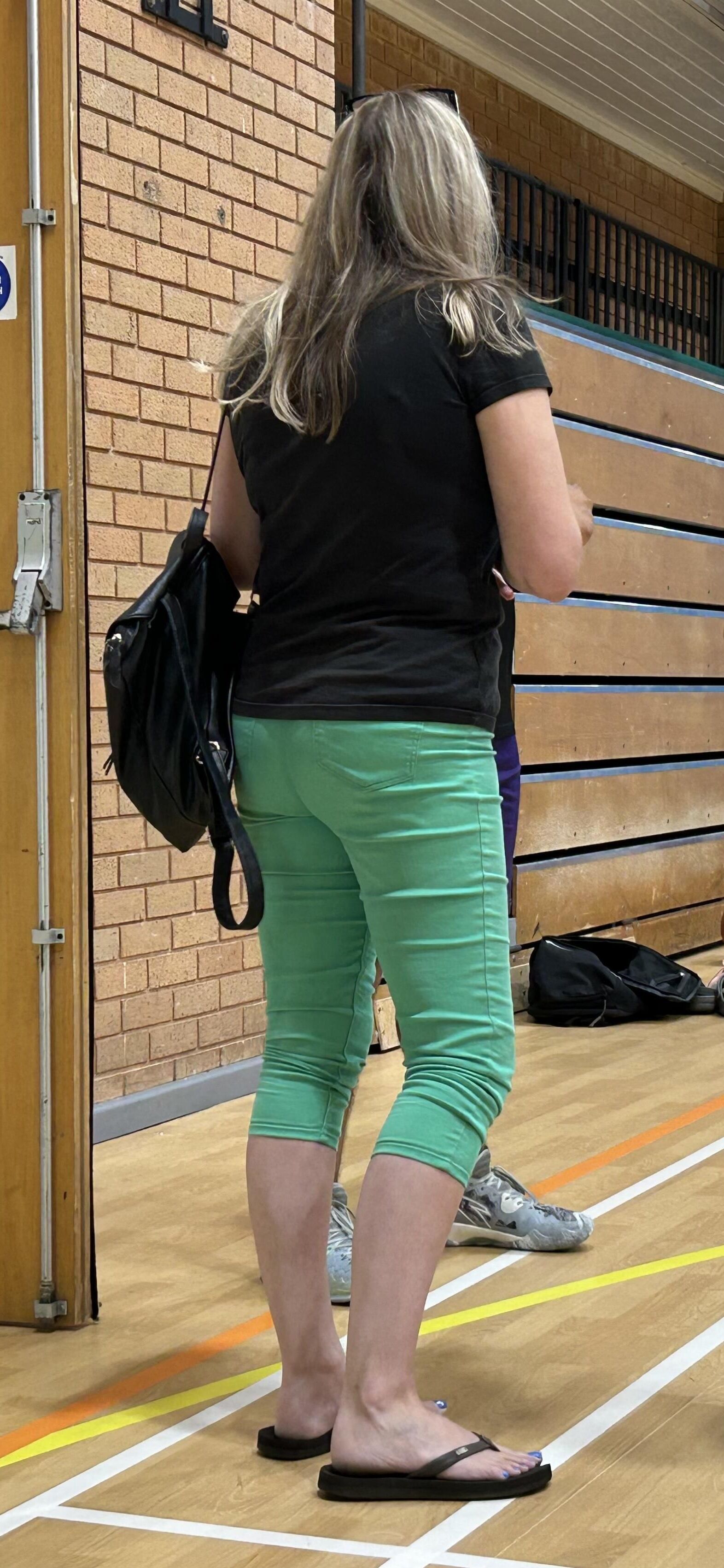 Sexy MILF bum in tight trousers