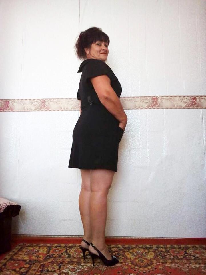 . Women fully dressed, no nudity